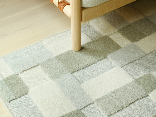 Domino ullmatta, grön från VM-carpet, närbild
